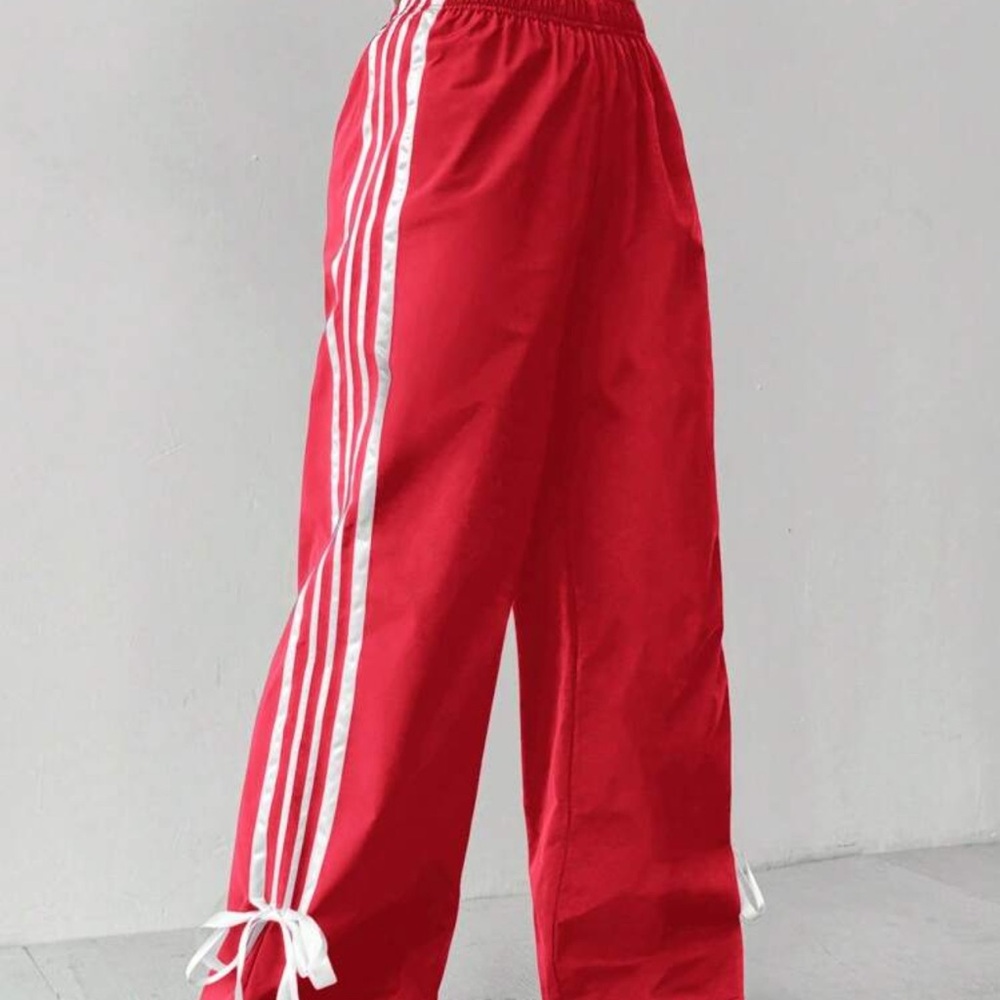 Red Track Pants with White Stripes